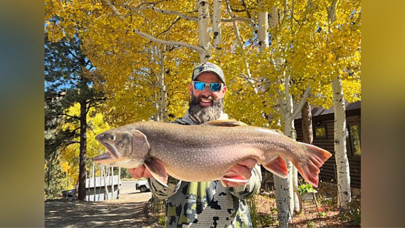 Matt Smiley, a Lake City resident, set a Colorado state record with an 8-pound brook trout catch.