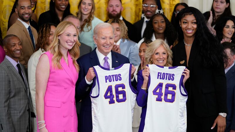 President Joe Biden and first lady Jill Biden are presented with jerseys by LSU women's...