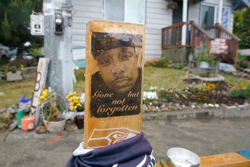 FILE - A sign is displayed on May 27, 2021, at a memorial in Tacoma, Wash., where Manuel...