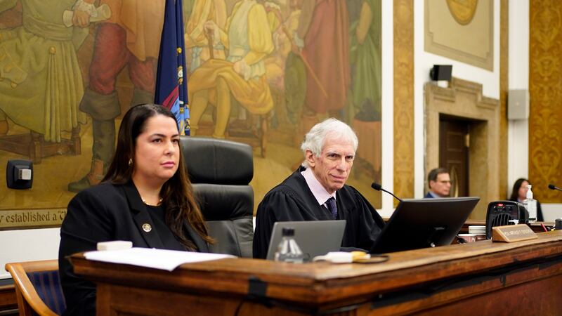 FILE - Judge Arthur Engoron, right, and principal law clerk Allison Greenfield sit on the...