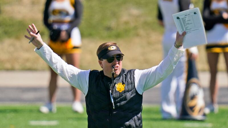 FILE - Missouri head coach Eliah Drinkwitz watches his team during an NCAA college football...