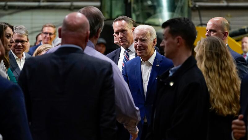 President Joe Biden talks to guests after speaking at POET Bioprocessing in Menlo, Iowa,...